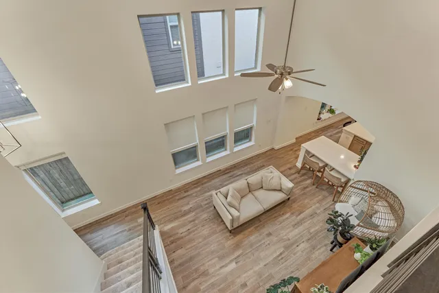 a view of a living room and wooden floor