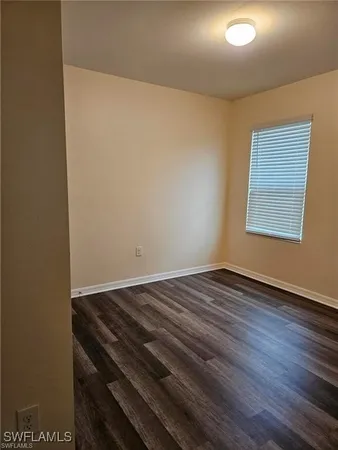 a bathroom with a sink toilet and a mirror