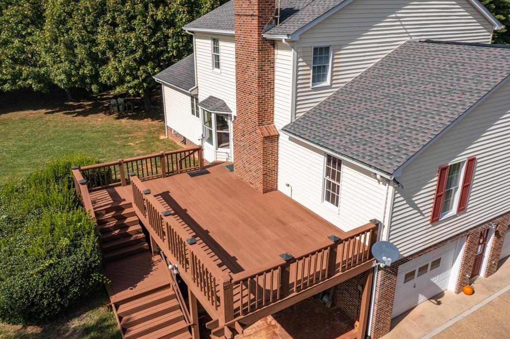 1275 Ladd Road Waynesboro, VA 22980 - Photo 14 of 75 a view of a roof deck with wooden floor and fence