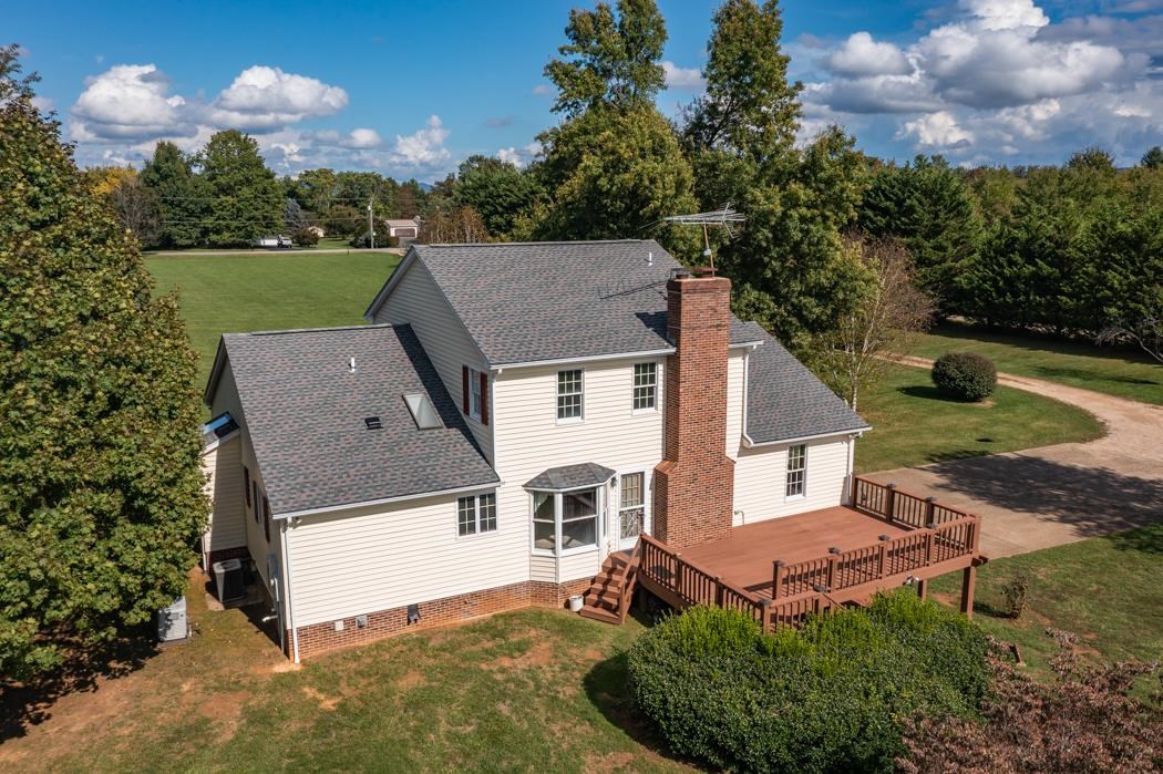 1275 Ladd Road Waynesboro, VA 22980 - Photo 17 of 75 an aerial view of a house with swimming pool and garden