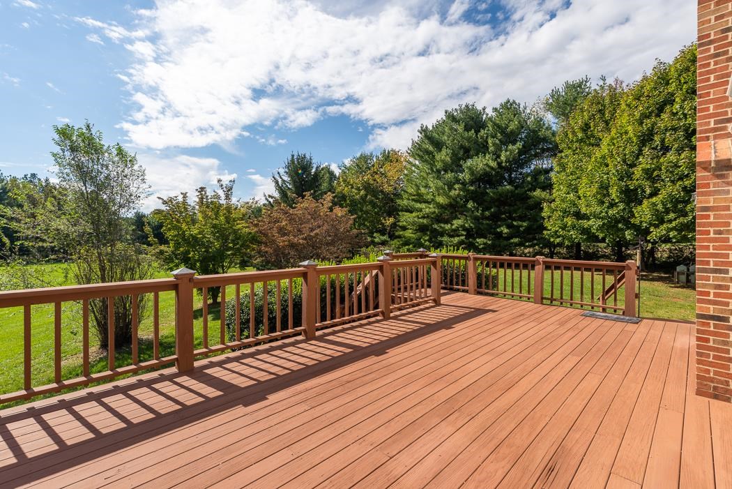 1275 Ladd Road Waynesboro, VA 22980 - Photo 20 of 75 a balcony with wooden floor and fence