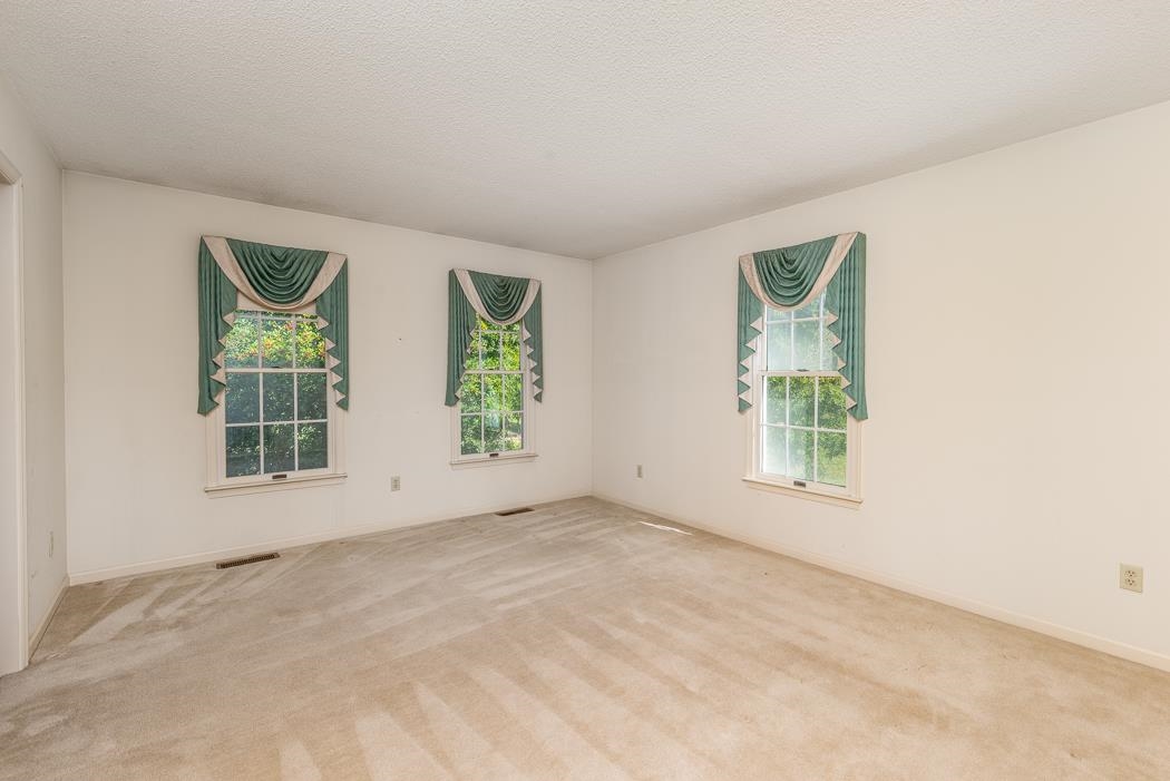 1275 Ladd Road Waynesboro, VA 22980 - Photo 27 of 75 an empty room with windows