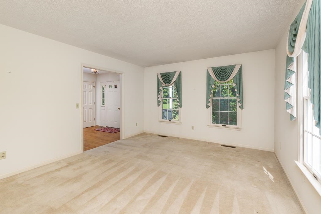 1275 Ladd Road Waynesboro, VA 22980 - Photo 28 of 75 an empty room with windows