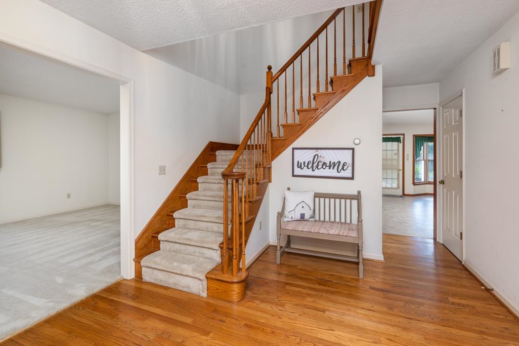 1275 Ladd Road Waynesboro, VA 22980 - Photo 31 of 75 a view of entryway with wooden floor and stairs