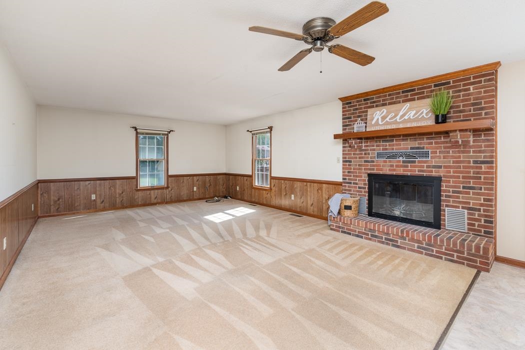 1275 Ladd Road Waynesboro, VA 22980 - Photo 33 of 75 a view of empty room with a fireplace and fan
