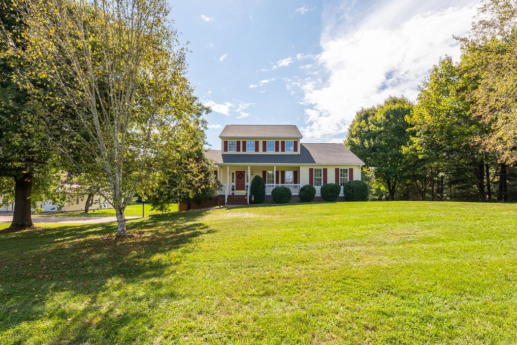 1275 Ladd Road Waynesboro, VA 22980 - Photo 5 of 75 a view of a big room with large trees and a big yard with a small yard