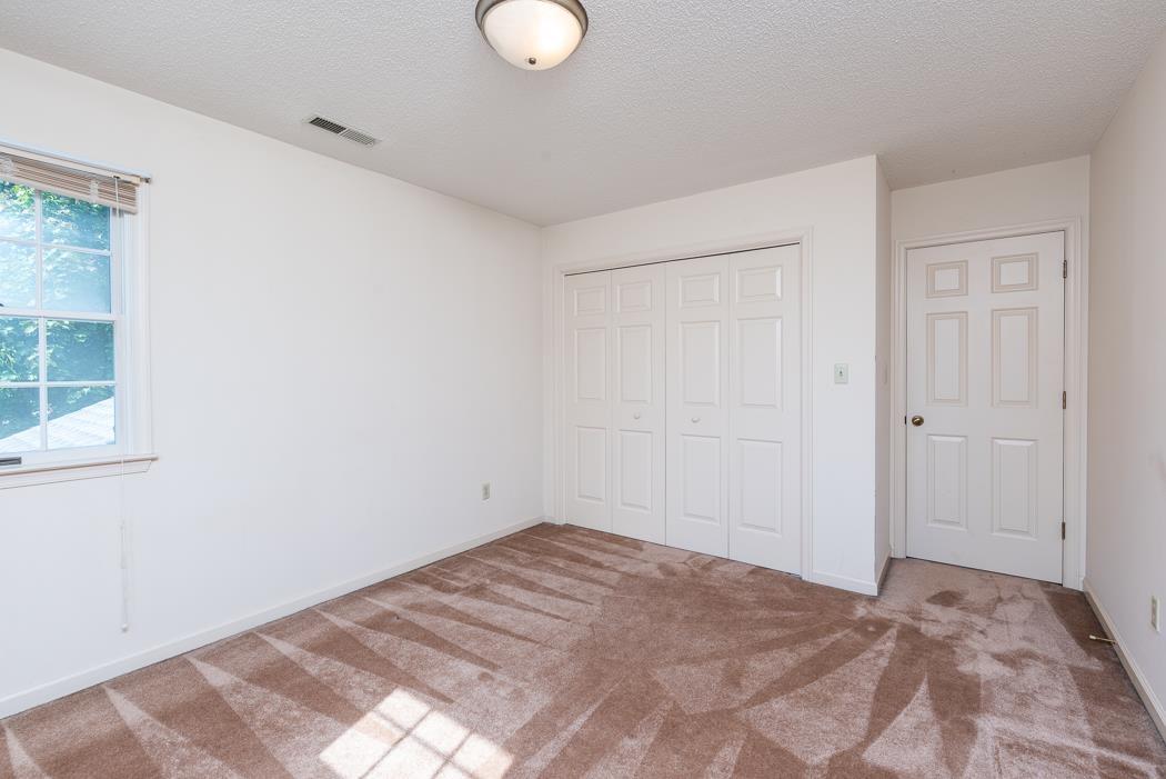 1275 Ladd Road Waynesboro, VA 22980 - Photo 63 of 75 a view of a room with a bed and wooden floor