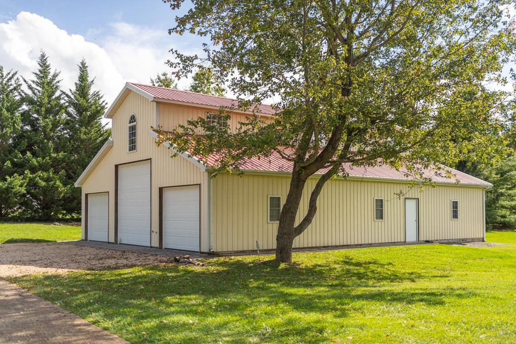 1275 Ladd Road Waynesboro, VA 22980 - Photo 69 of 75 a house with a tree in front of it