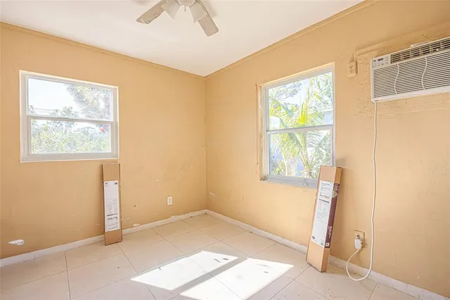 an empty room with windows