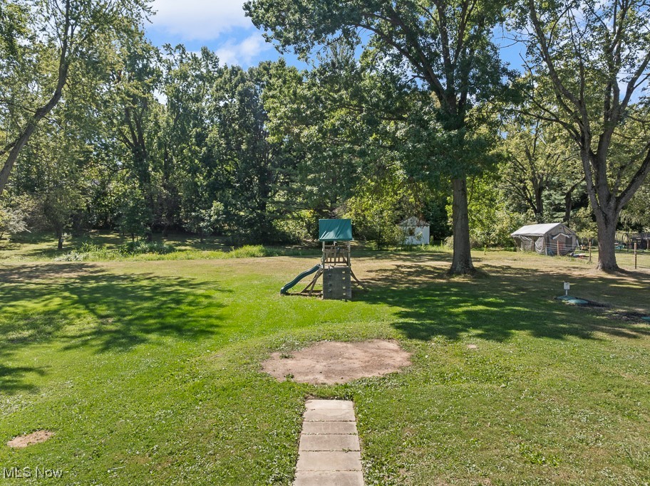 1702 Far View Road Akron, OH 44312 - Photo 45 of 49 View of green lawn featuring a playground