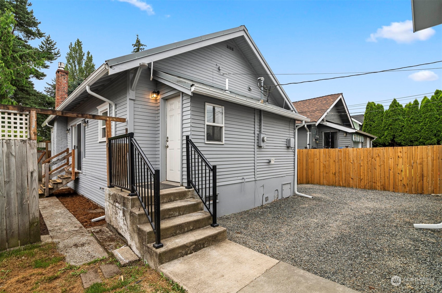 3015 21st Street Everett, WA 98201 - Photo 14 of 26 a view of a house with wooden fence