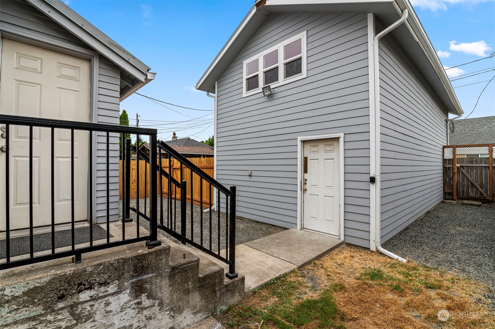 3015 21st Street Everett, WA 98201 - Photo 17 of 26 a view of a house with wooden fence