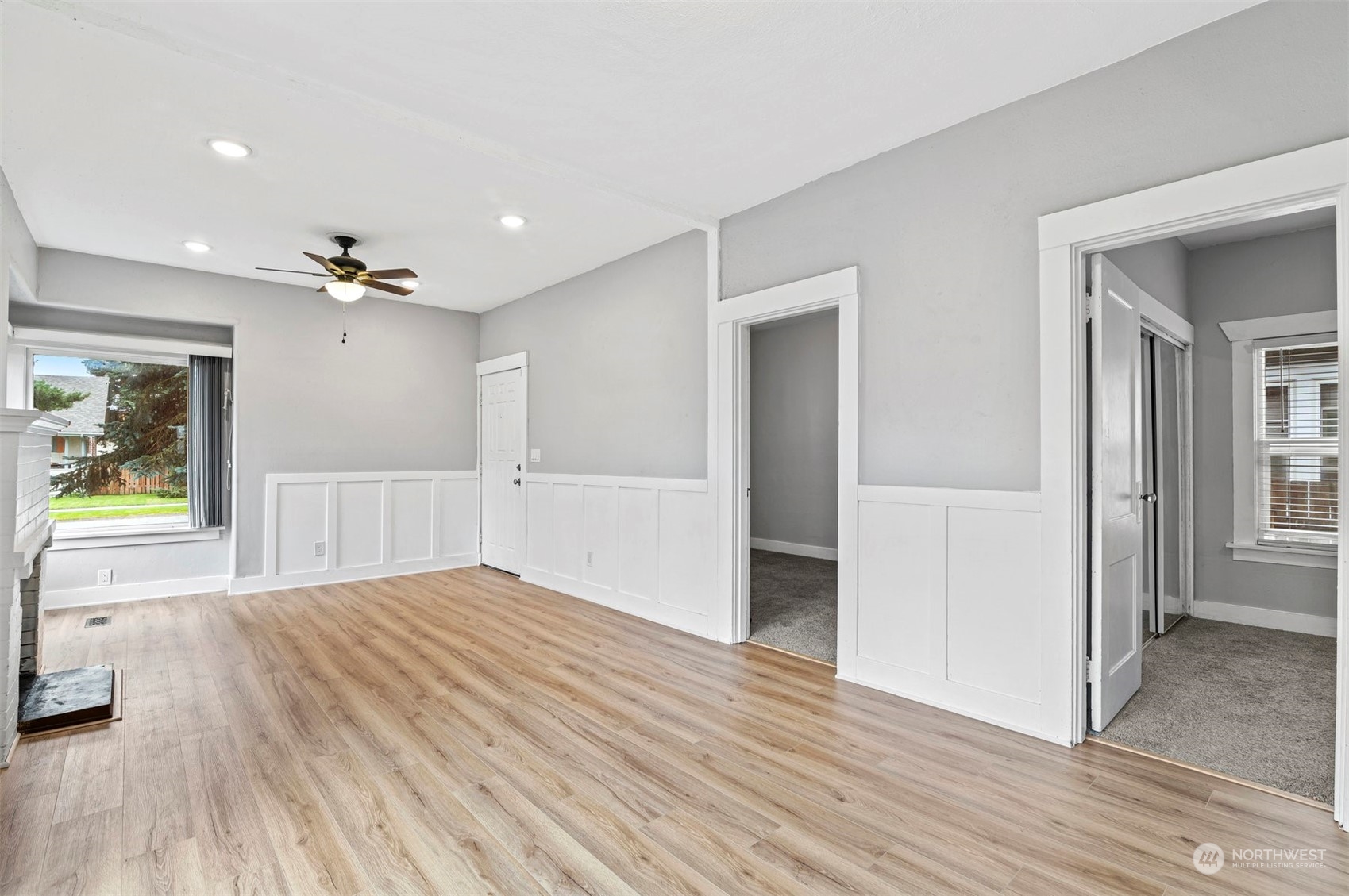 3015 21st Street Everett, WA 98201 - Photo 6 of 26 wooden floor in an empty room with a window