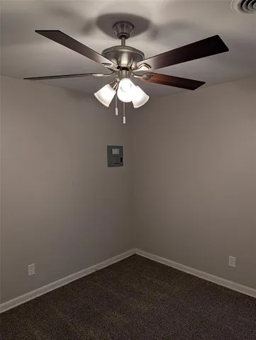 a view of a small space with a fan