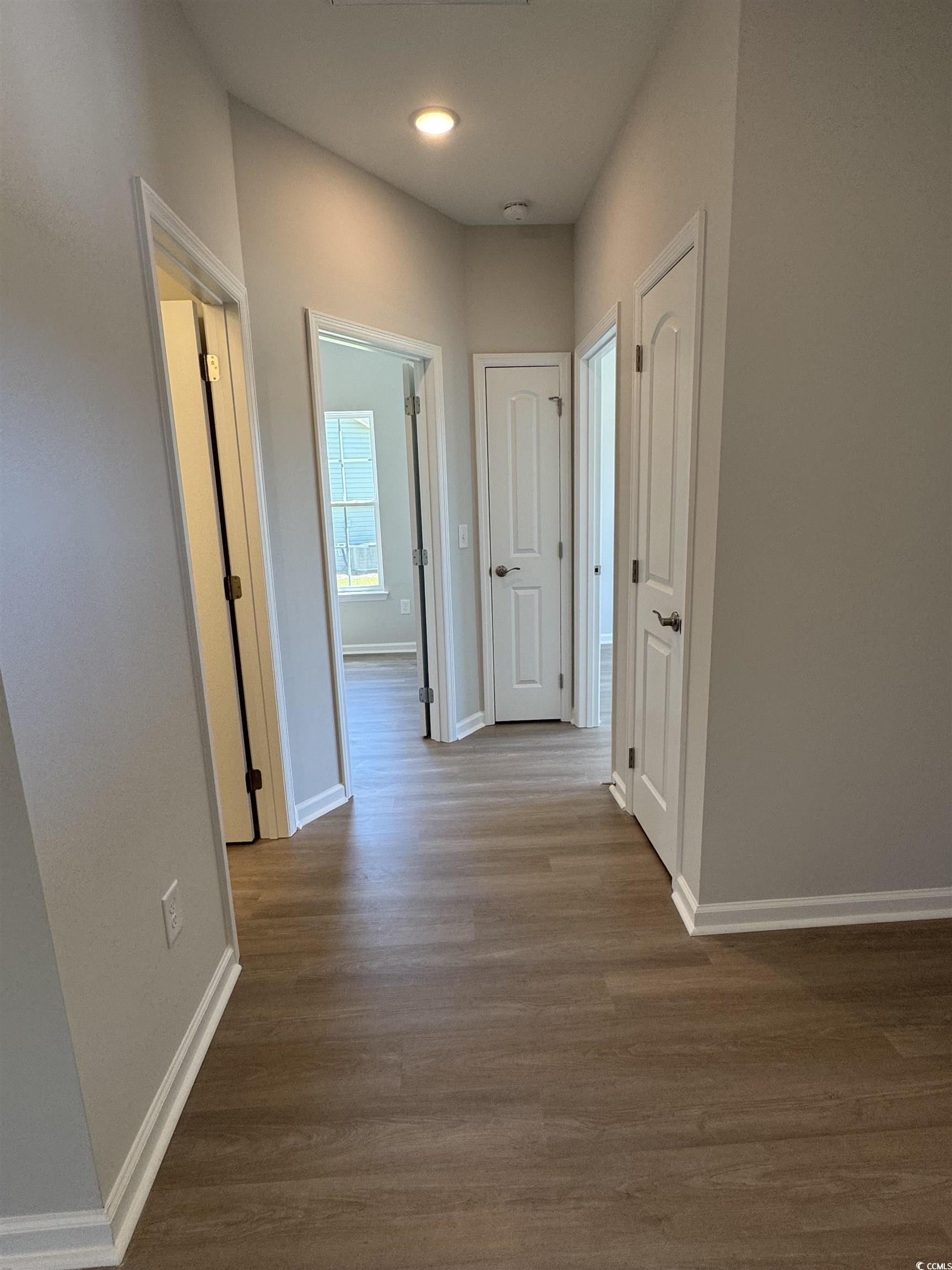 598 Shallow Cv Drive Conway, SC 29527 - Photo 13 of 25 Hall featuring dark wood-style flooring and basebo