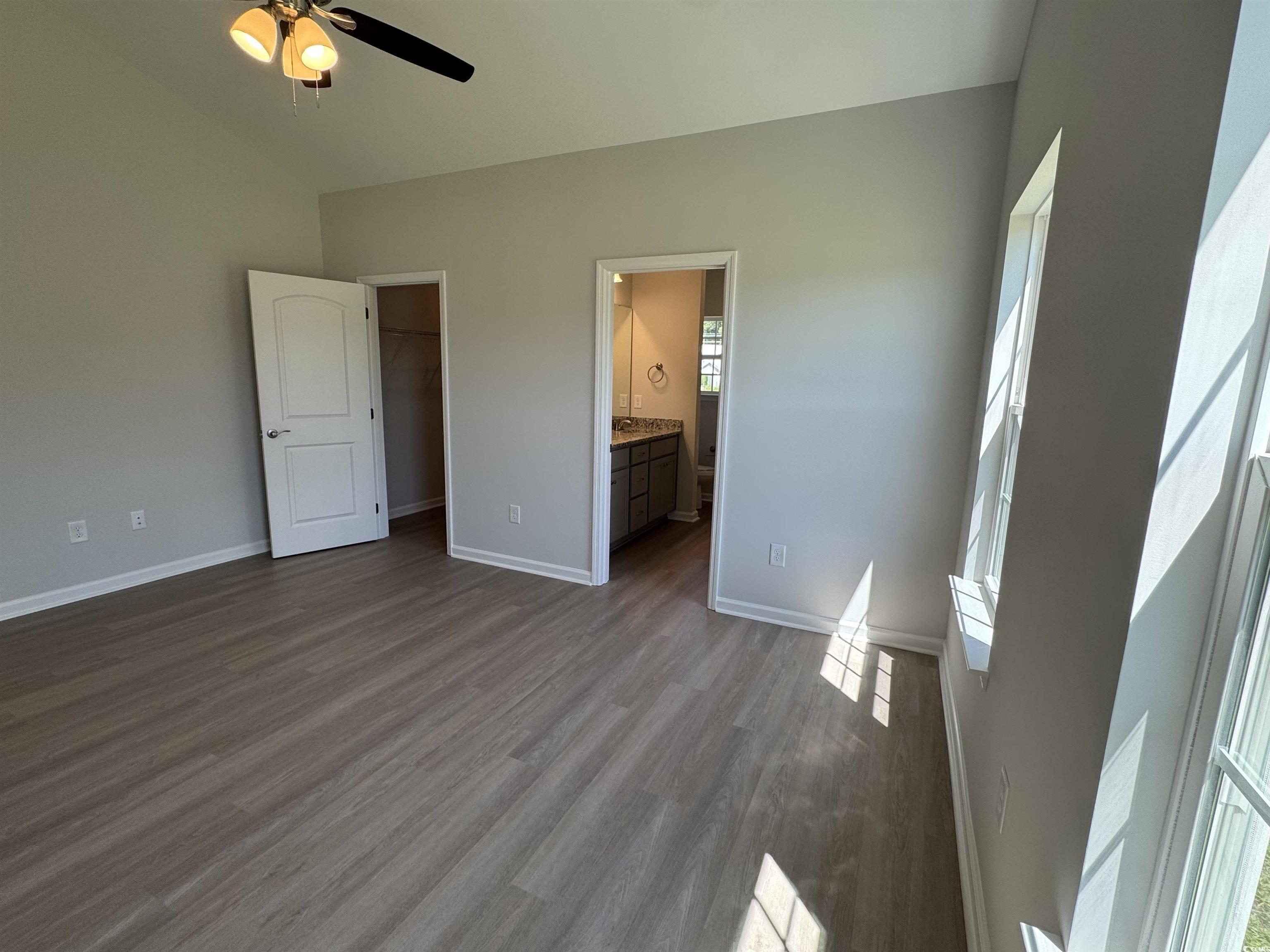 598 Shallow Cv Drive Conway, SC 29527 - Photo 23 of 25 Unfurnished bedroom featuring a walk in closet, da