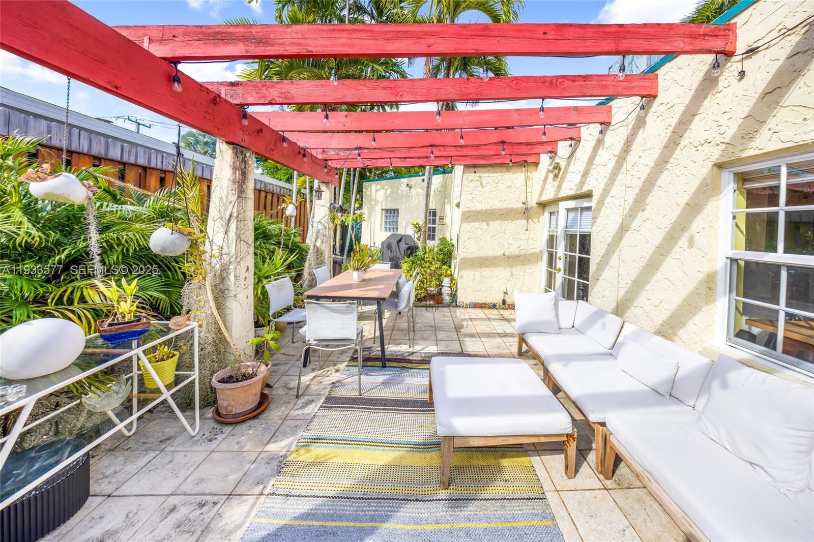 1840 Tigertail Avenue Miami, FL 33133 - Photo 20 of 32 a outdoor space with lots of tables and chairs