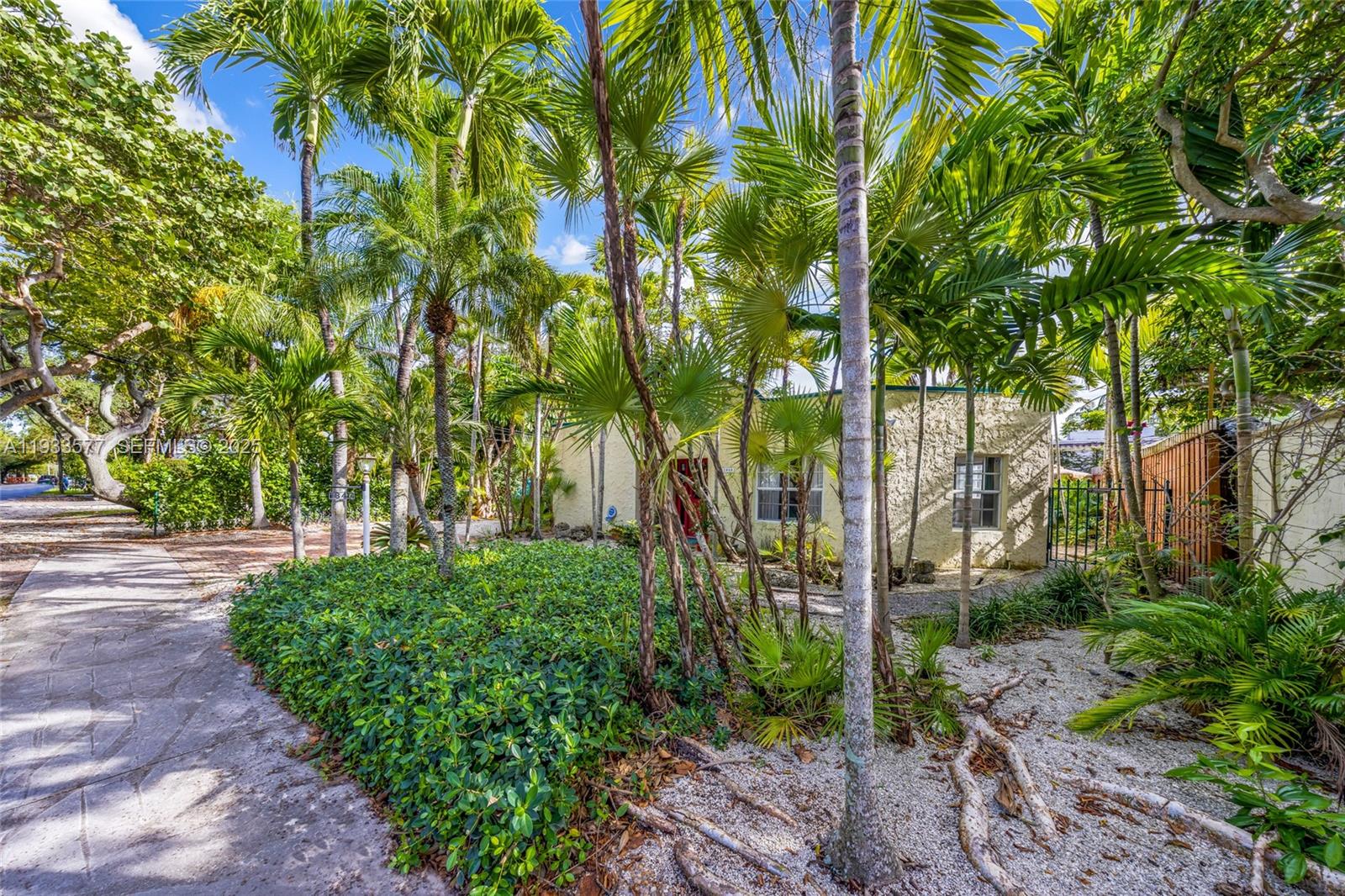 1840 Tigertail Avenue Miami, FL 33133 - Photo 32 of 32 a view of a garden