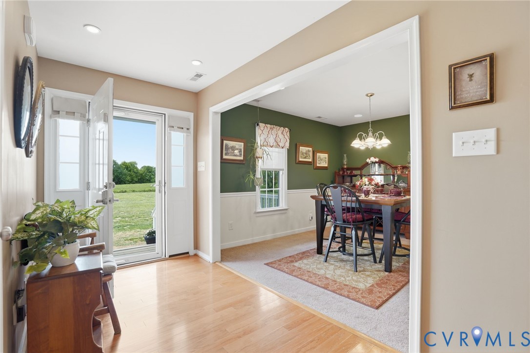 19012 Teman Road Beaverdam, VA 23015 - Photo 6 of 41 a view of a dining room with furniture window and wooden floor