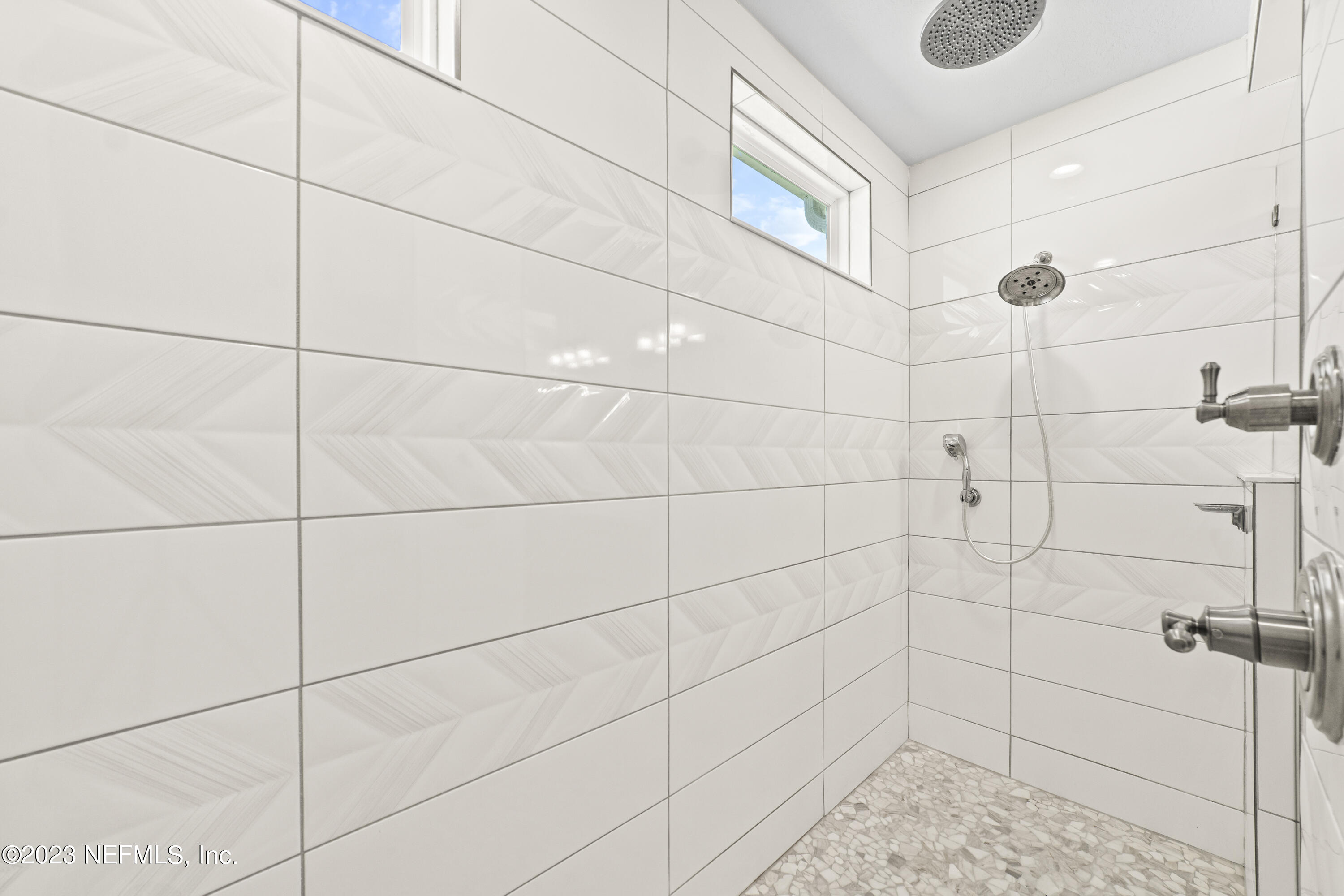 855 Flach Drive St. Johns, FL 32259 - Photo 30 of 50 a bathroom with a shower