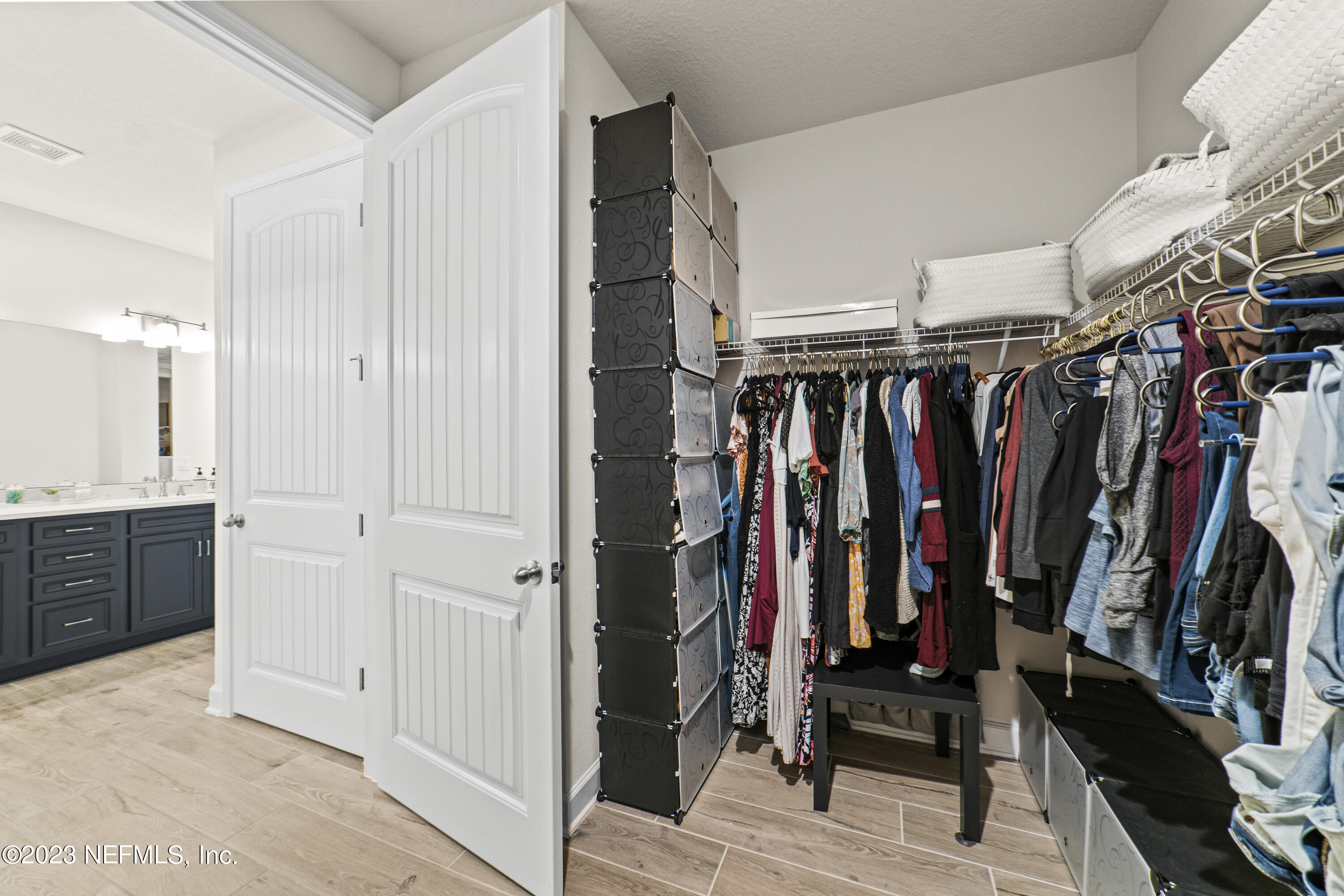 855 Flach Drive St. Johns, FL 32259 - Photo 32 of 50 a view of walk in closet with clothes
