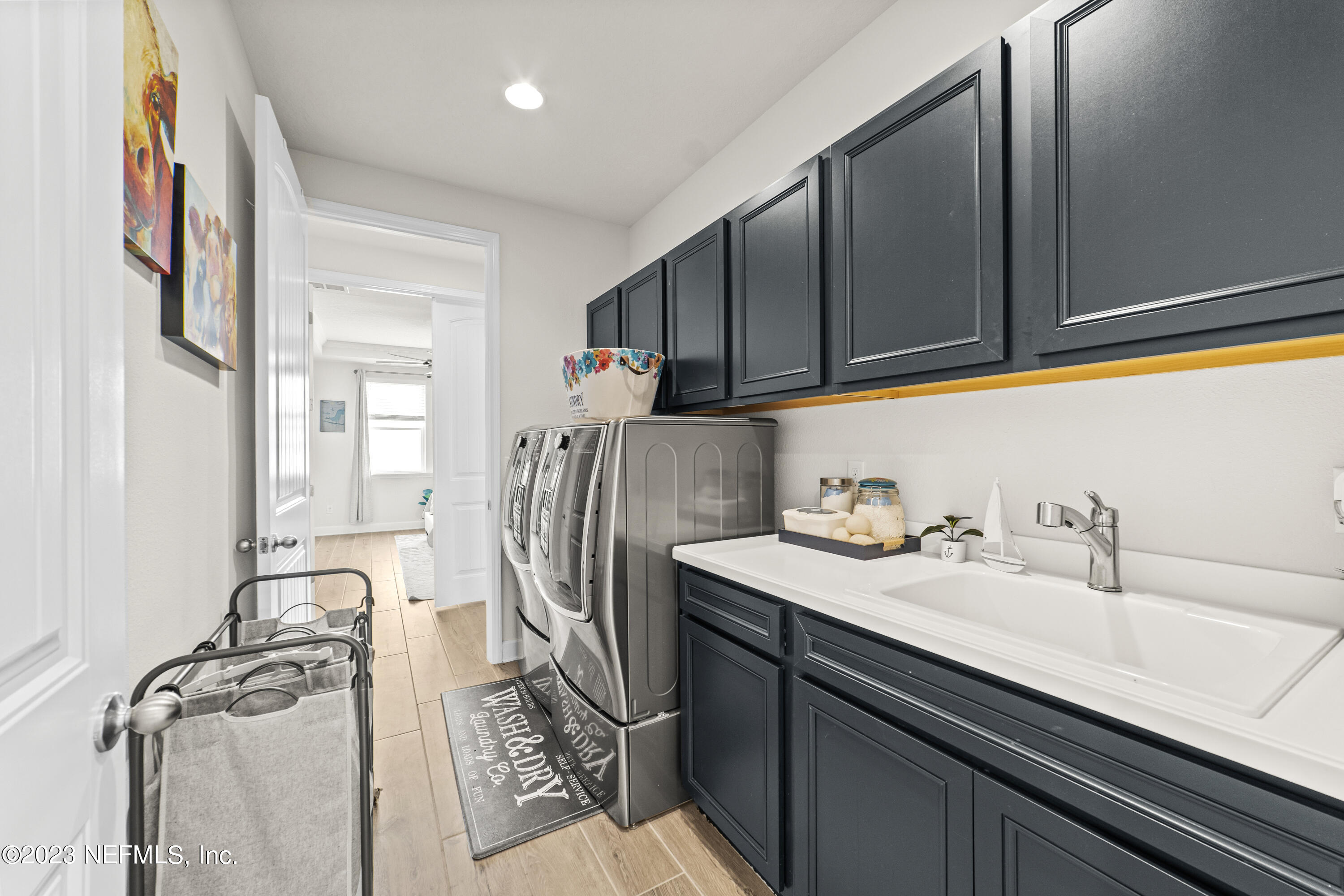 855 Flach Drive St. Johns, FL 32259 - Photo 33 of 50 a bathroom with a sink and a mirror