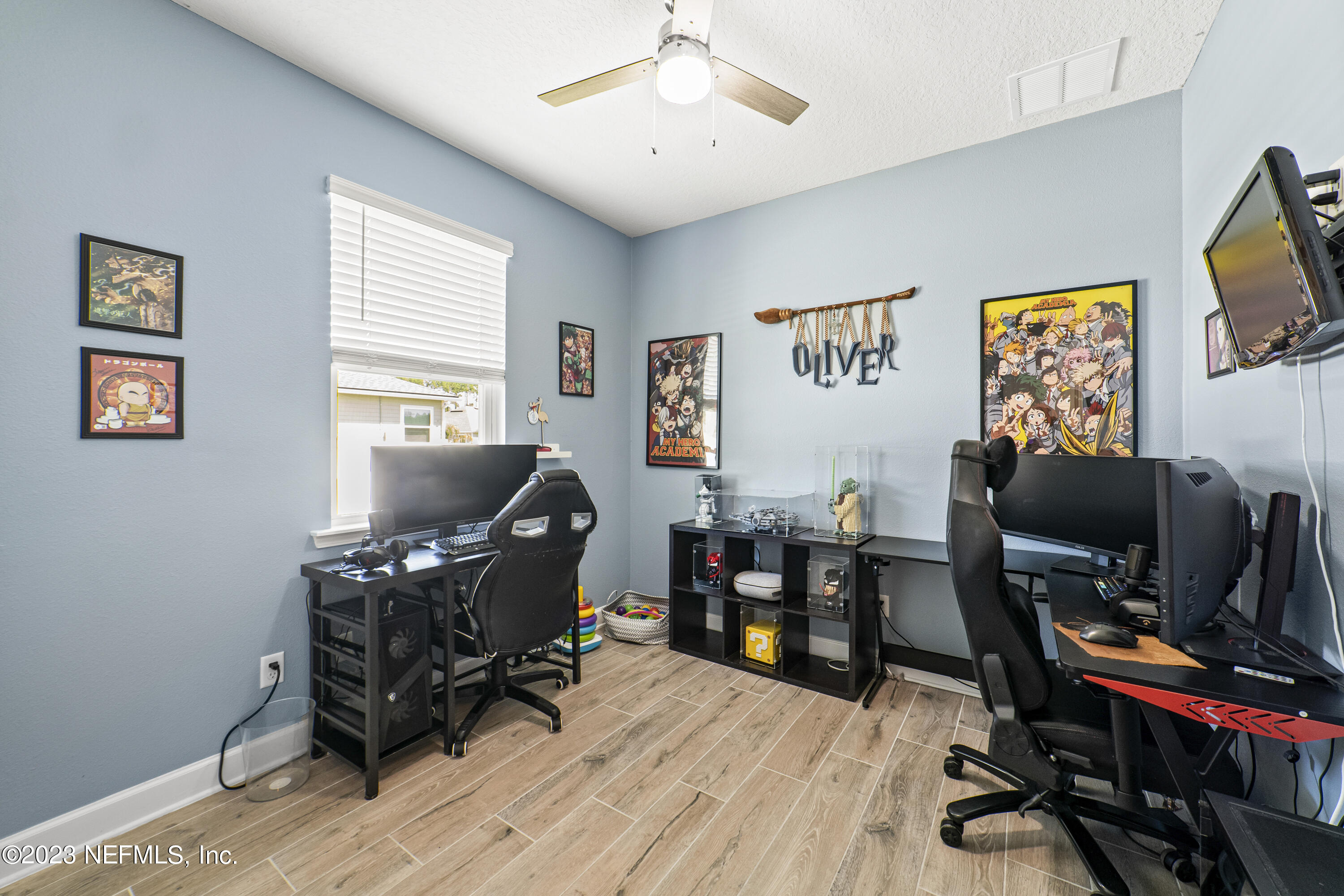 855 Flach Drive St. Johns, FL 32259 - Photo 35 of 50 a livingroom with workspace and a window