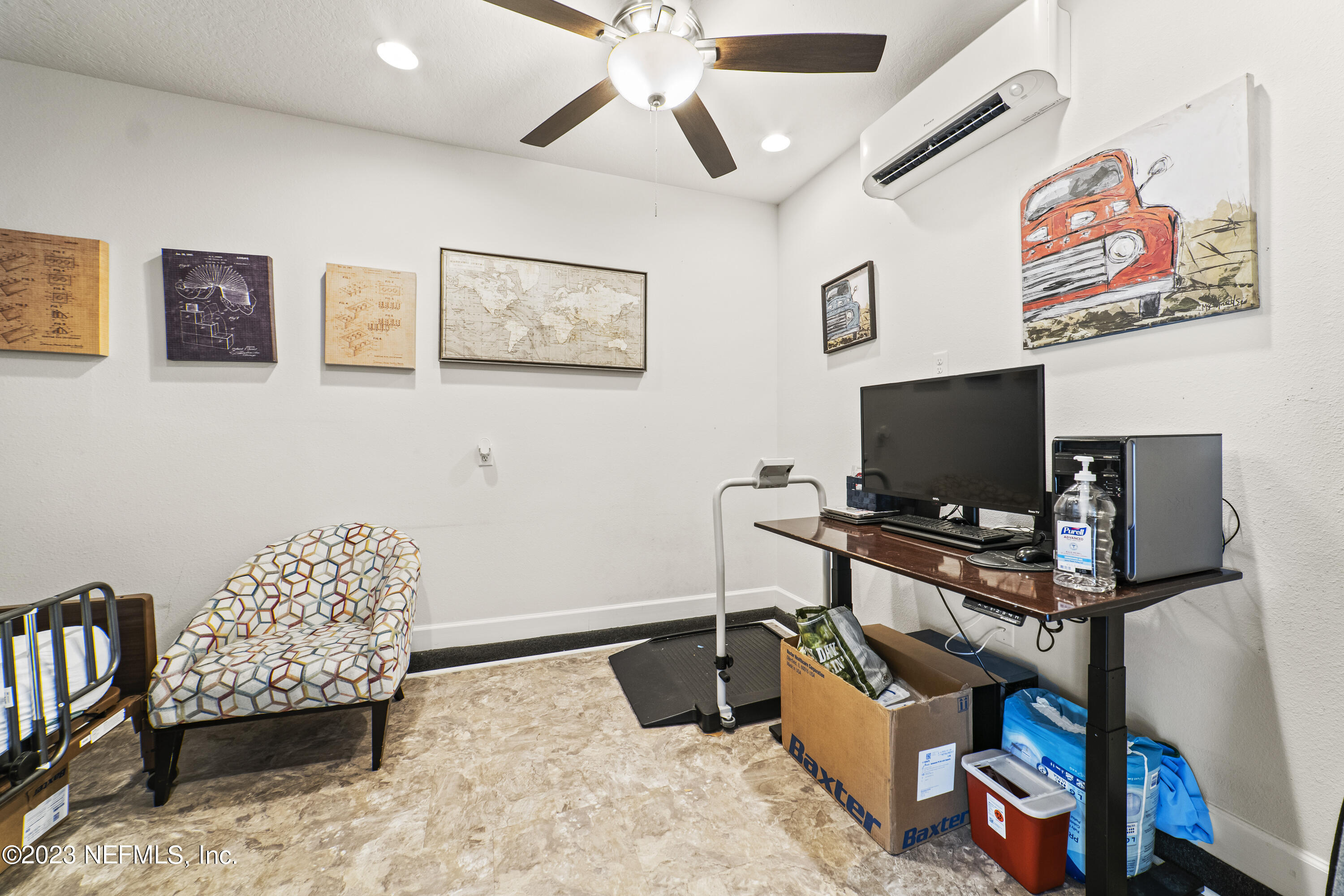 855 Flach Drive St. Johns, FL 32259 - Photo 50 of 50 a bedroom with furniture and a flat screen tv