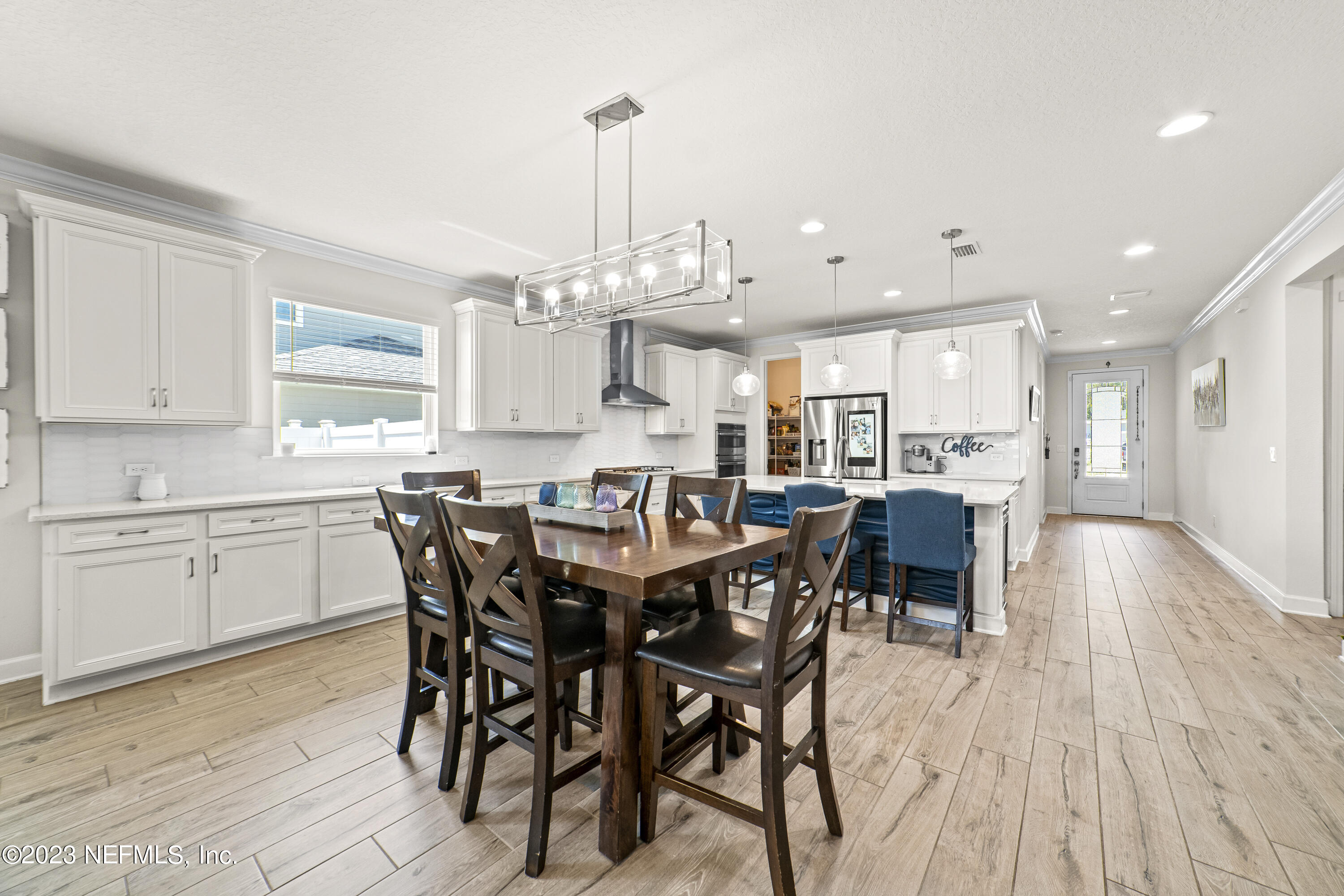 855 Flach Drive St. Johns, FL 32259 - Photo 5 of 50 a view of a dining area with furniture