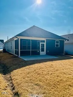 a view of a house with snow on the road