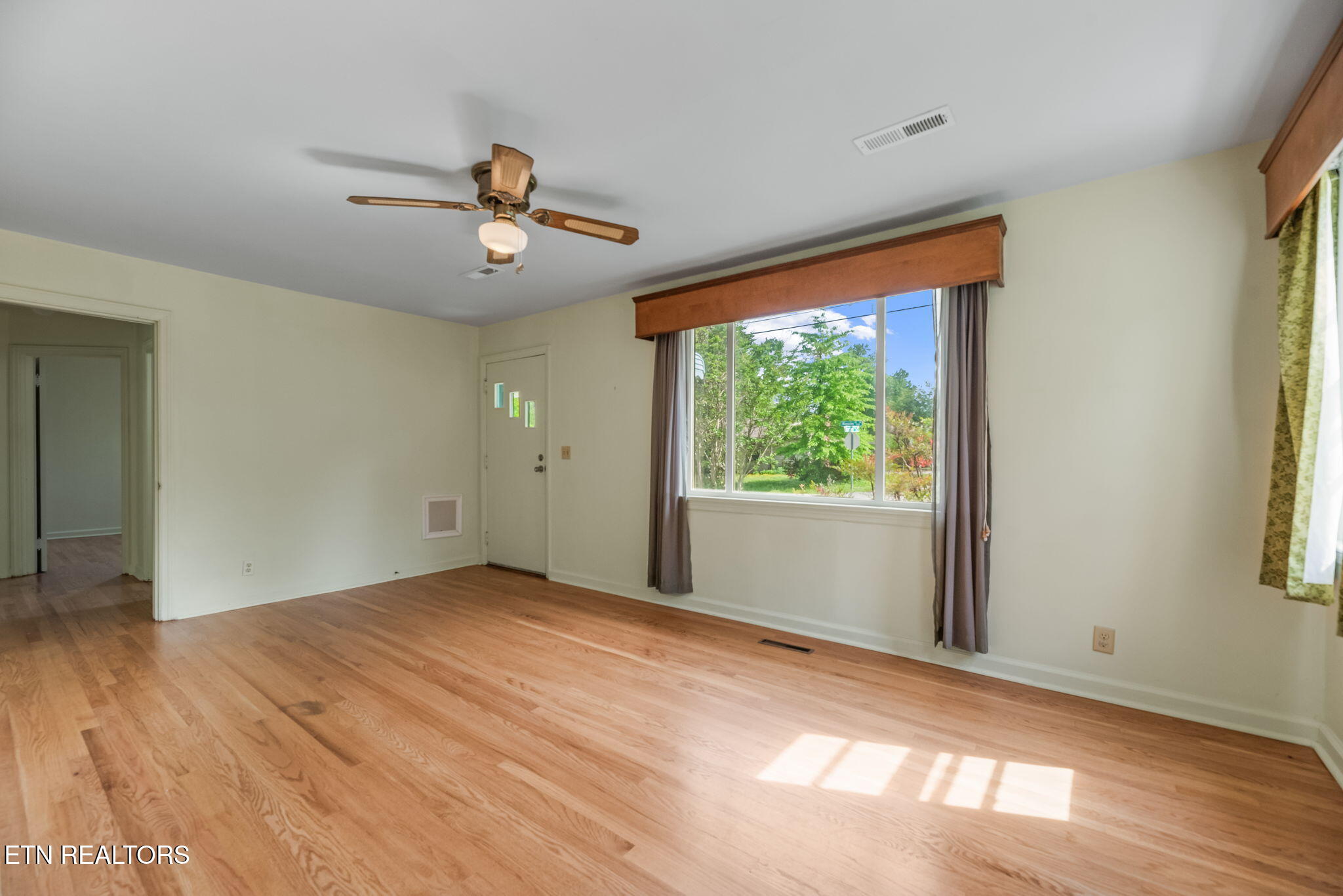 6109 Magazine Road Knoxville, TN 37920 - Photo 7 of 30 07 Living Room View from Kitchen Doorway