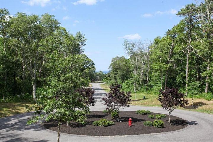 6 Rockhill Road Sandwich, MA 02563 - Photo 2 of 3 a view of a park with large trees