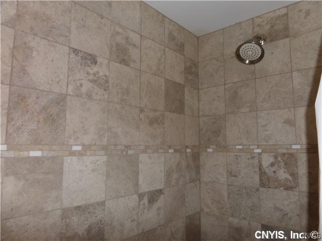7750 Morgan Road Van Buren, NY 13027 - Photo 11 of 22 Bathroom. BEAUTIFUL NEW TILE IN MAIN BATH SHOWER/T