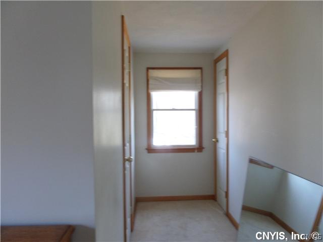 7750 Morgan Road Van Buren, NY 13027 - Photo 14 of 22 Master Bedroom. HALLWAY IN MASTER BEDROOM LEADS TO