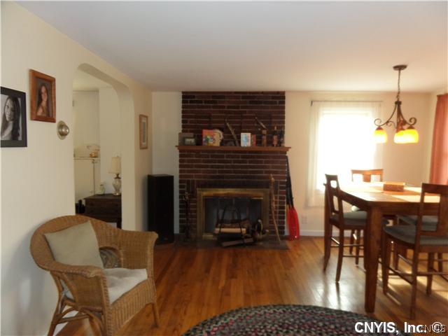 7750 Morgan Road Van Buren, NY 13027 - Photo 3 of 22 Living Room. LIVING AND DINING AREA WITH NICE WOOD