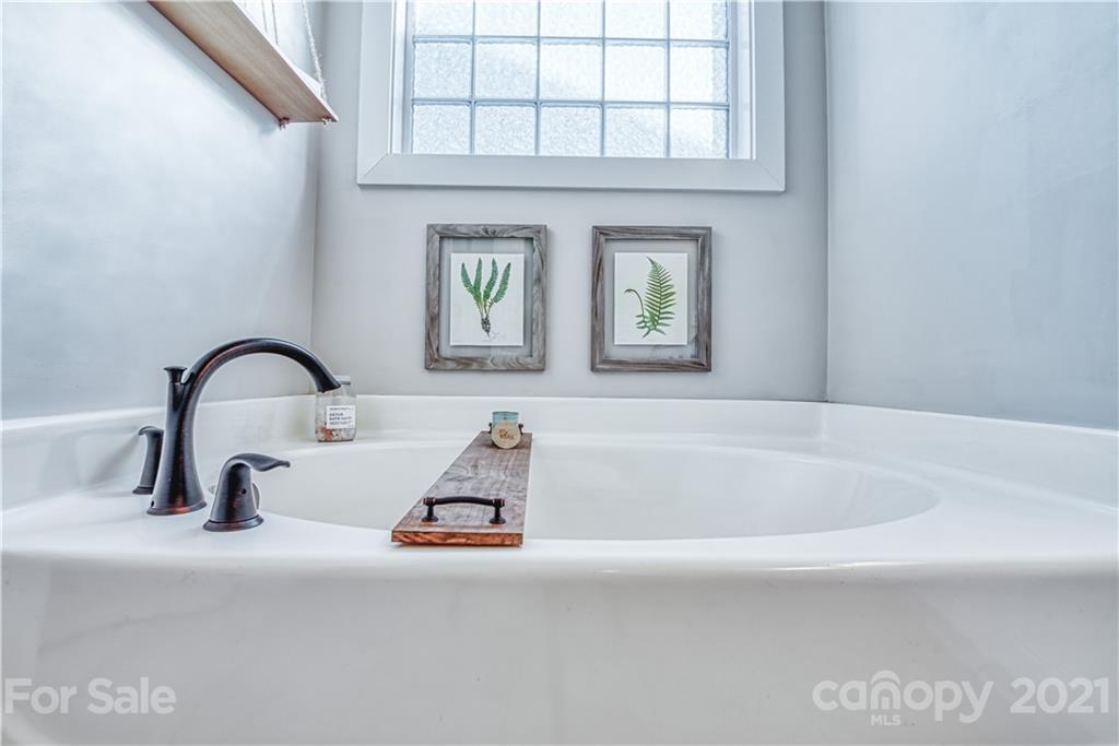 3547 Richard's Crossing Fort Mill, SC 29708 - Photo 19 of 41 a bath tub sitting next to a bathroom sink