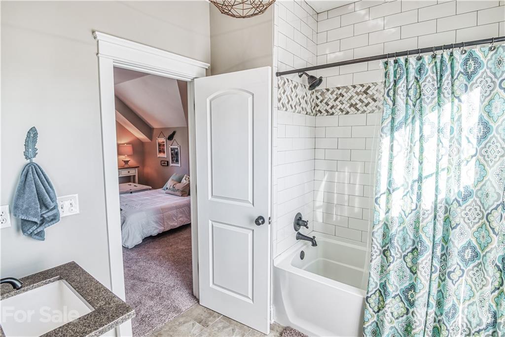 3547 Richard's Crossing Fort Mill, SC 29708 - Photo 24 of 41 a bathroom with a tub and shower