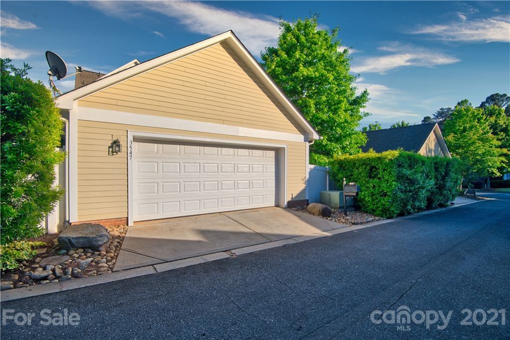 3547 Richard's Crossing Fort Mill, SC 29708 - Photo 27 of 41 a view of a house with a yard and garage