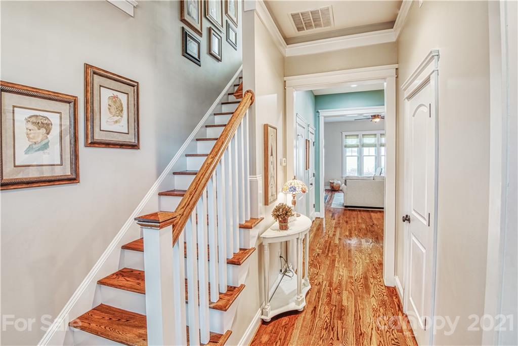 3547 Richard's Crossing Fort Mill, SC 29708 - Photo 5 of 41 a view of an entryway with wooden floor and stairs