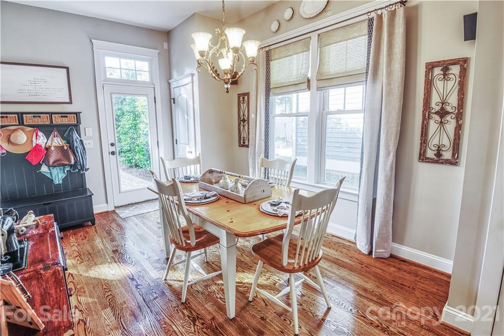 3547 Richard's Crossing Fort Mill, SC 29708 - Photo 9 of 41 a view of a dining room with furniture wooden floor and chandelier