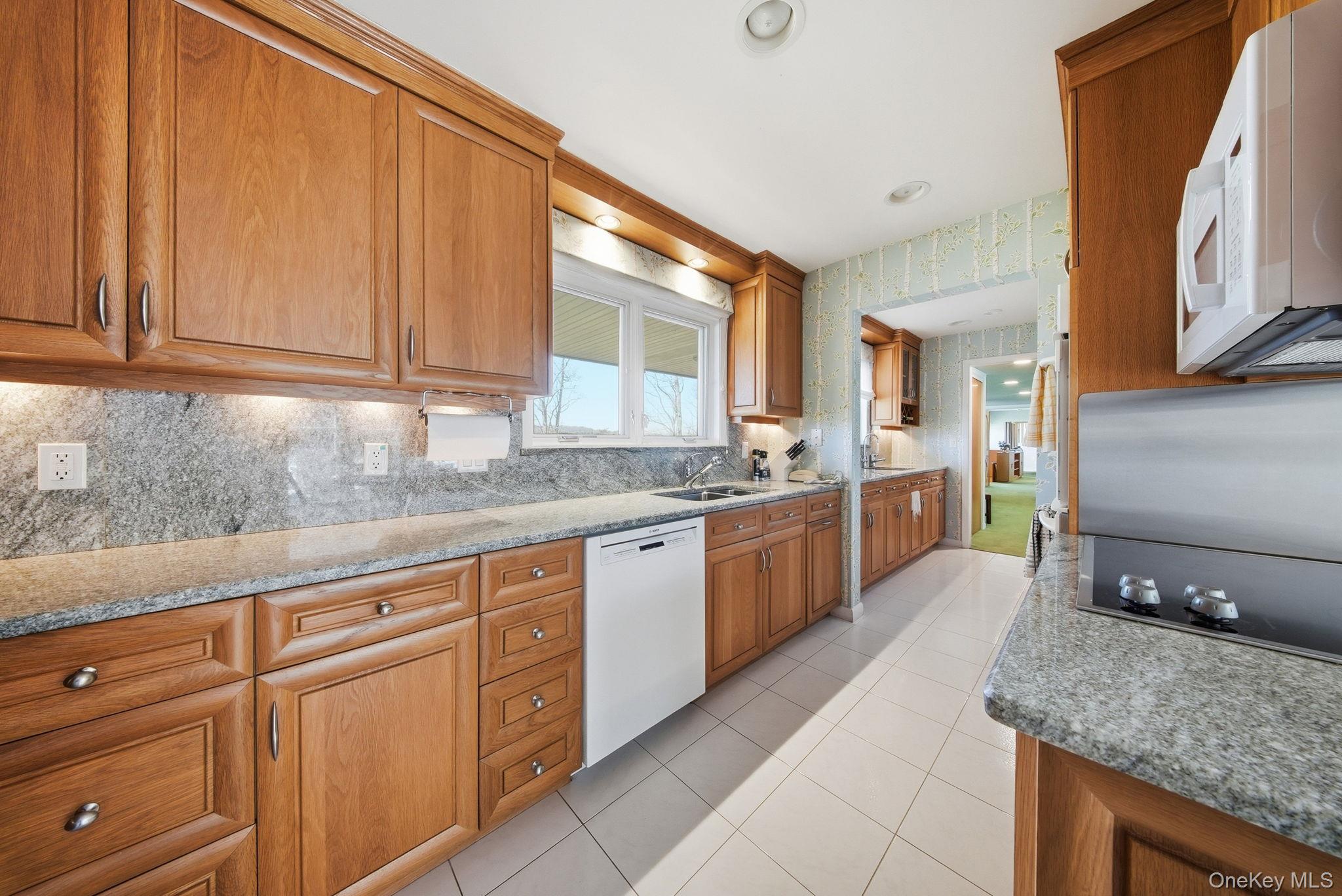 736 Highway 94 Warwick, NY 10921 - Photo 12 of 49 a large kitchen with granite countertop a sink