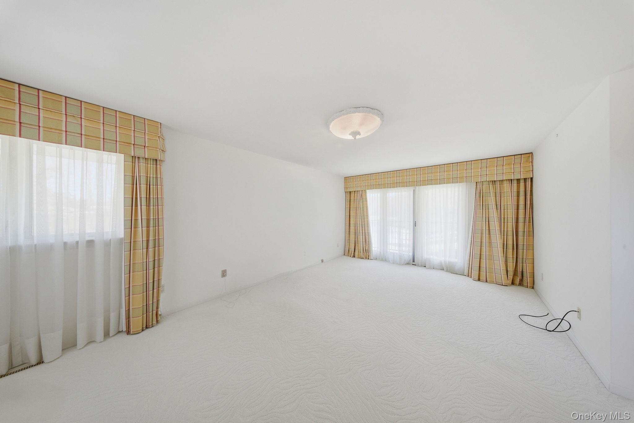 736 Highway 94 Warwick, NY 10921 - Photo 23 of 49 a view of an empty room with a window