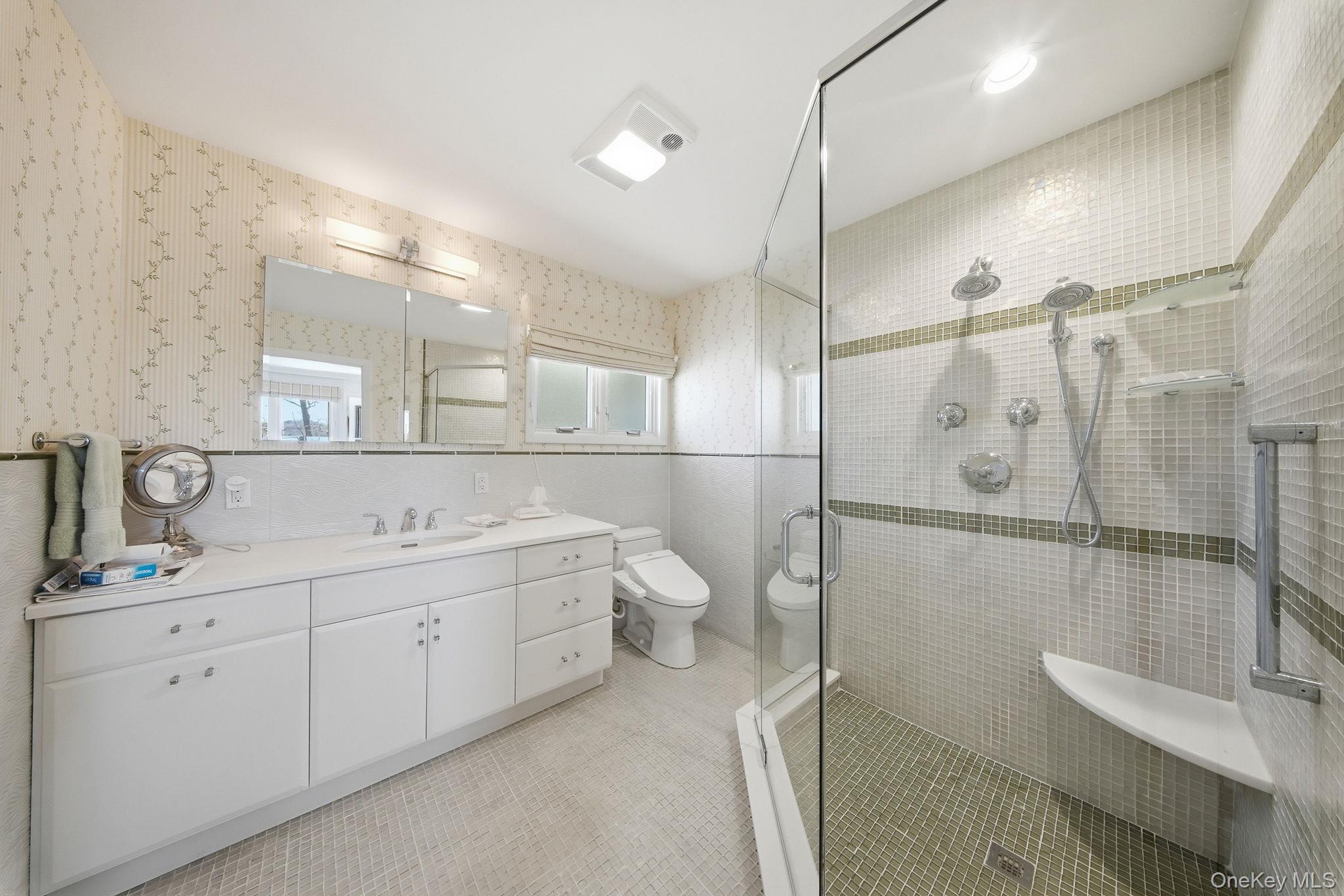 736 Highway 94 Warwick, NY 10921 - Photo 25 of 49 a bathroom with a double vanity sink mirror and toilet