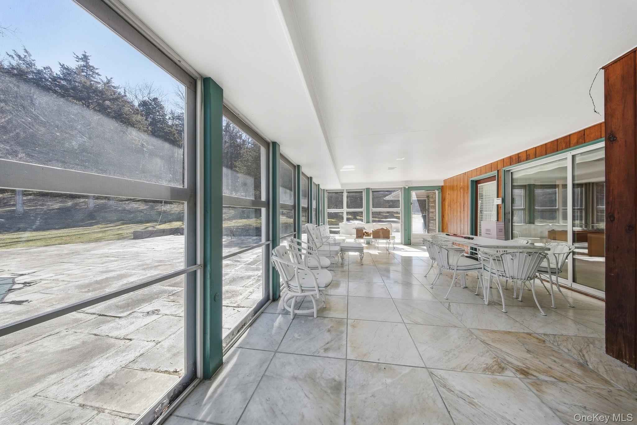 736 Highway 94 Warwick, NY 10921 - Photo 27 of 49 a view of a dining room with furniture window and outside view