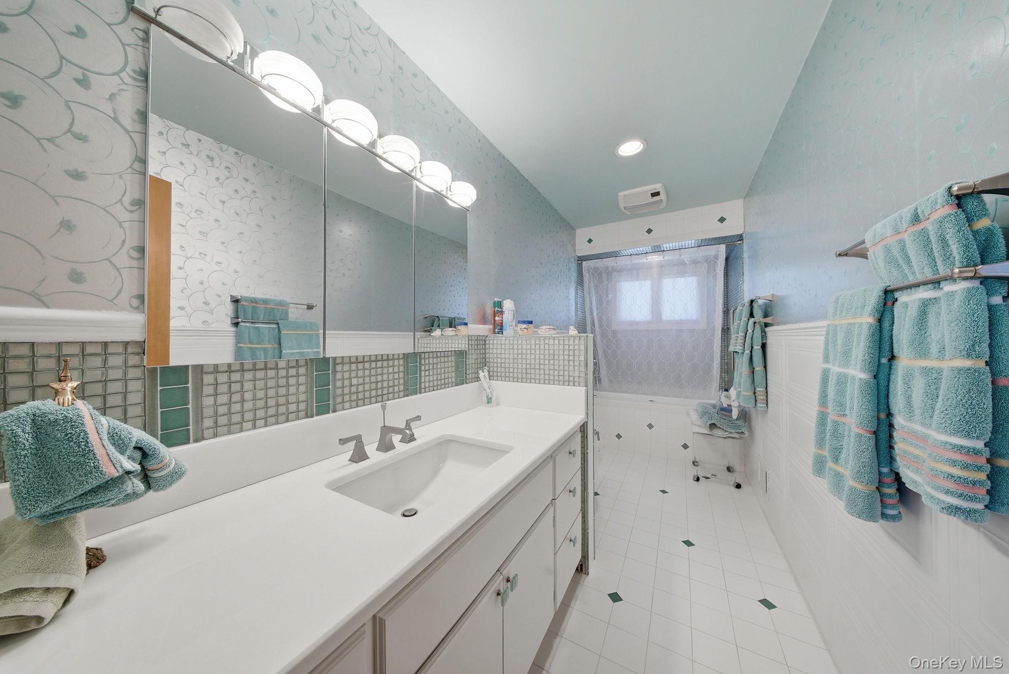 736 Highway 94 Warwick, NY 10921 - Photo 34 of 49 a bathroom with a sink double vanity and a shower
