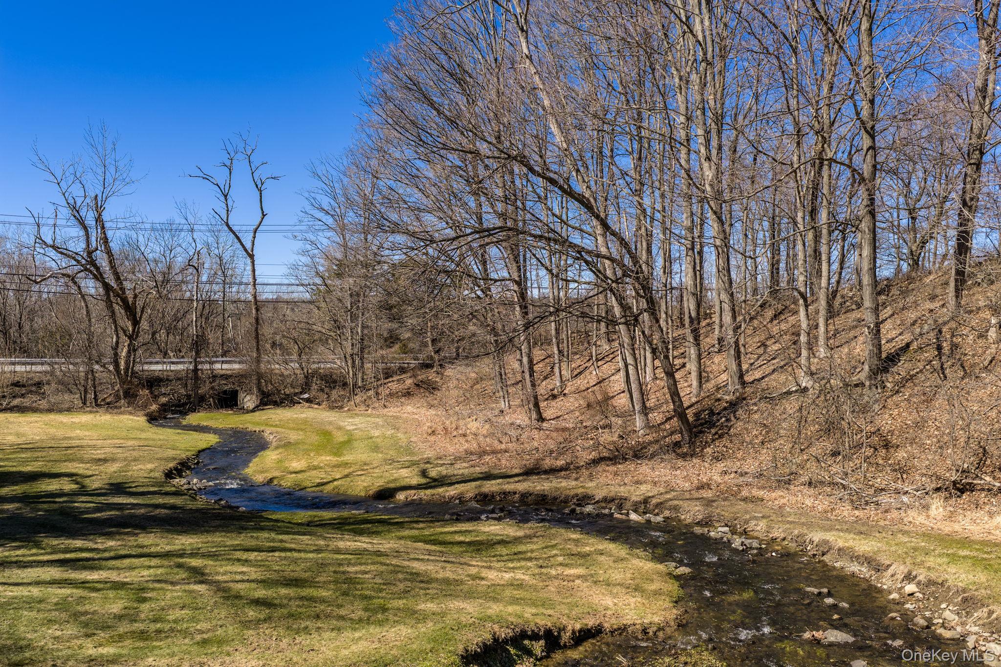736 Highway 94 Warwick, NY 10921 - Photo 48 of 49 a view of a water with large trees beside of it