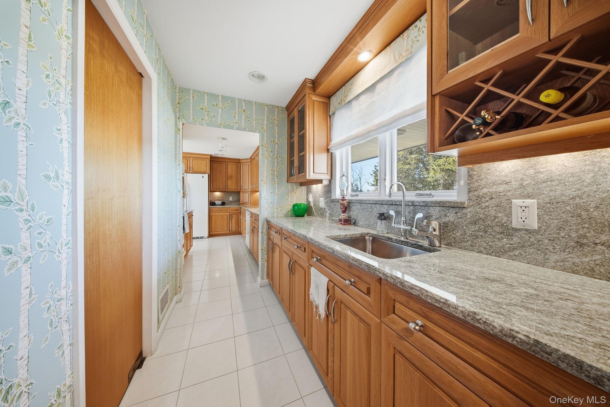 736 Highway 94 Warwick, NY 10921 - Photo 8 of 49 a large white kitchen with a sink and cabinets