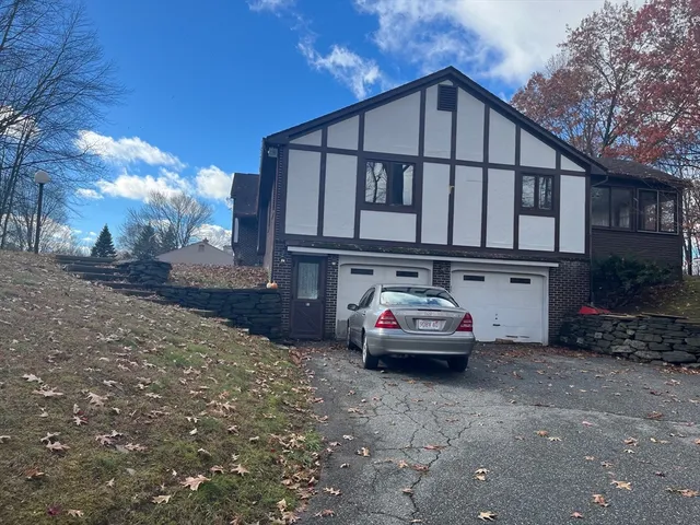 a car parked in front of a house