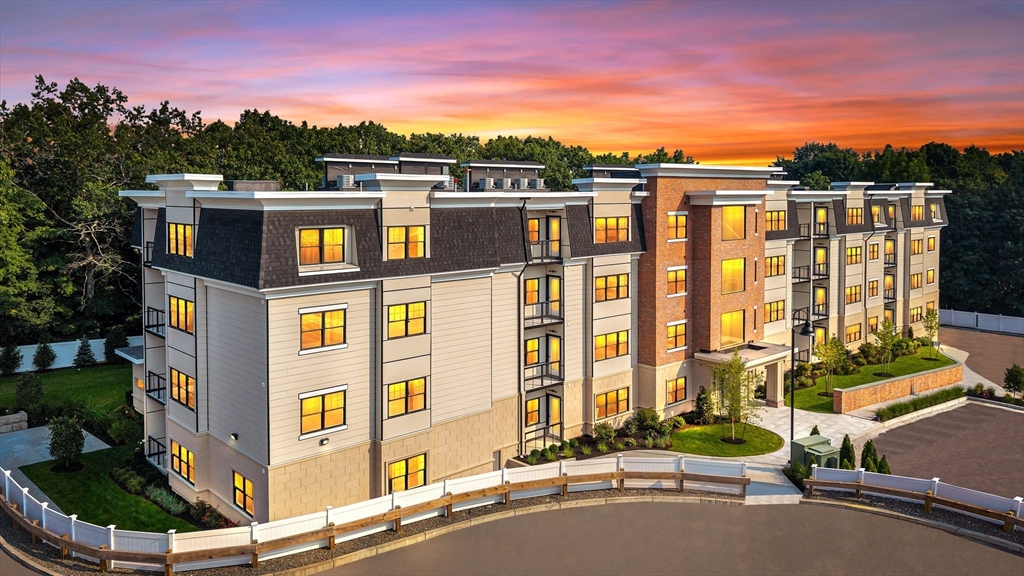 20 Audubon Way, Unit 408 Canton, MA 02021 - Photo 19 of 22 a view of a city with tall buildings