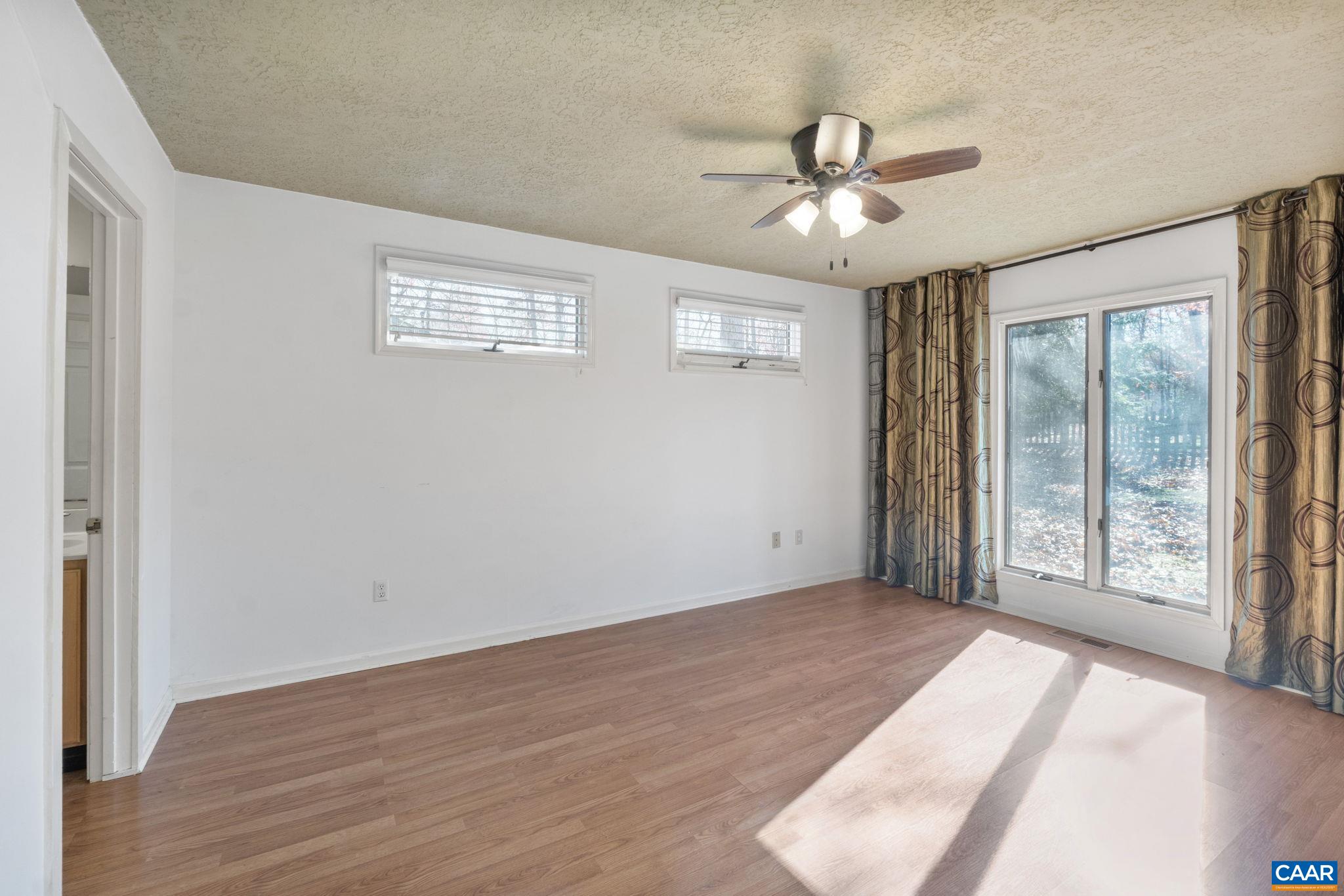 30 Colonial Road Palmyra, VA 22963 - Photo 14 of 30 a view of an empty room with wooden floor and a window